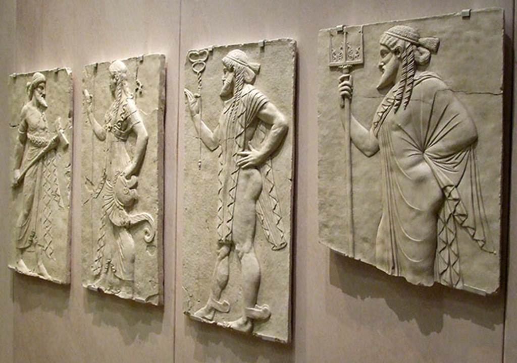 Herculaneum, September 2009. Sacred Area terrace, the shrine of Four Gods. Copy of reliefs of the four gods.
From the left are Vulcan, Minerva, Mercury and Neptune.
Photographed at “A Day in Pompeii” exhibition at Melbourne Museum.